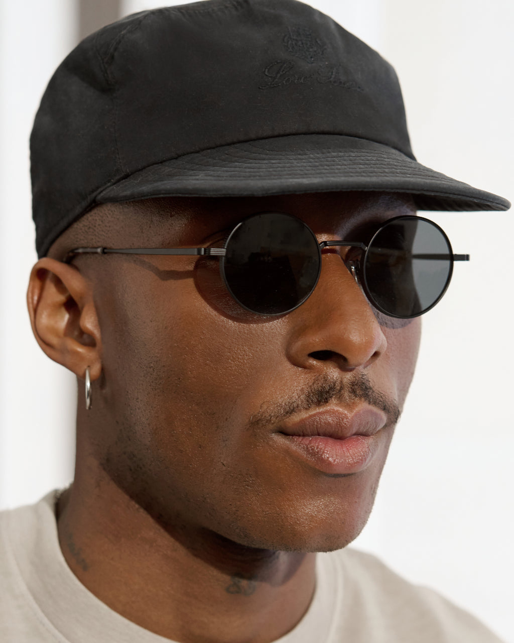 The Reos Rund Herren-Sonnenbrillen in Schwarz