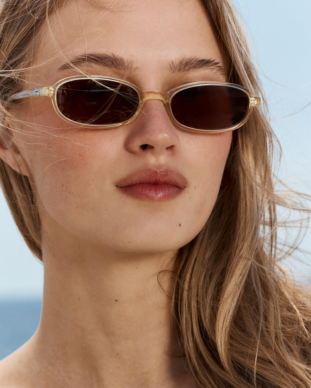 The Emmy Oval Women's Sunglasses in Crystal yellow