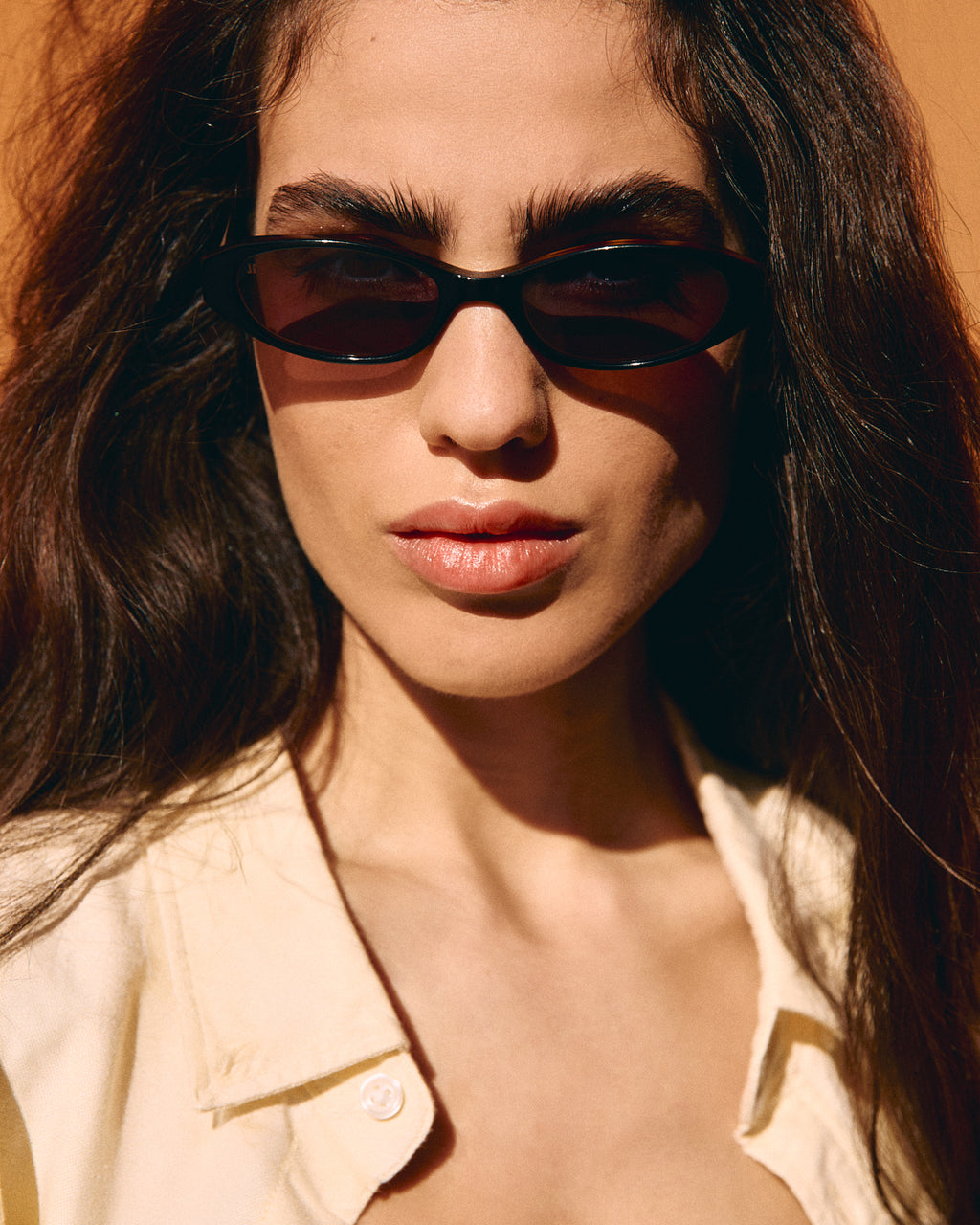 The Cassi Oval Women's Sunglasses in Black