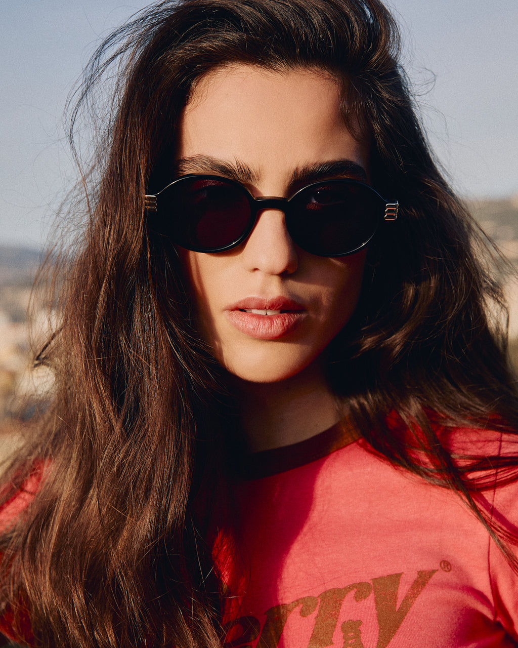 La Carvi Rond Lunettes de Soleil pour femme in Noir