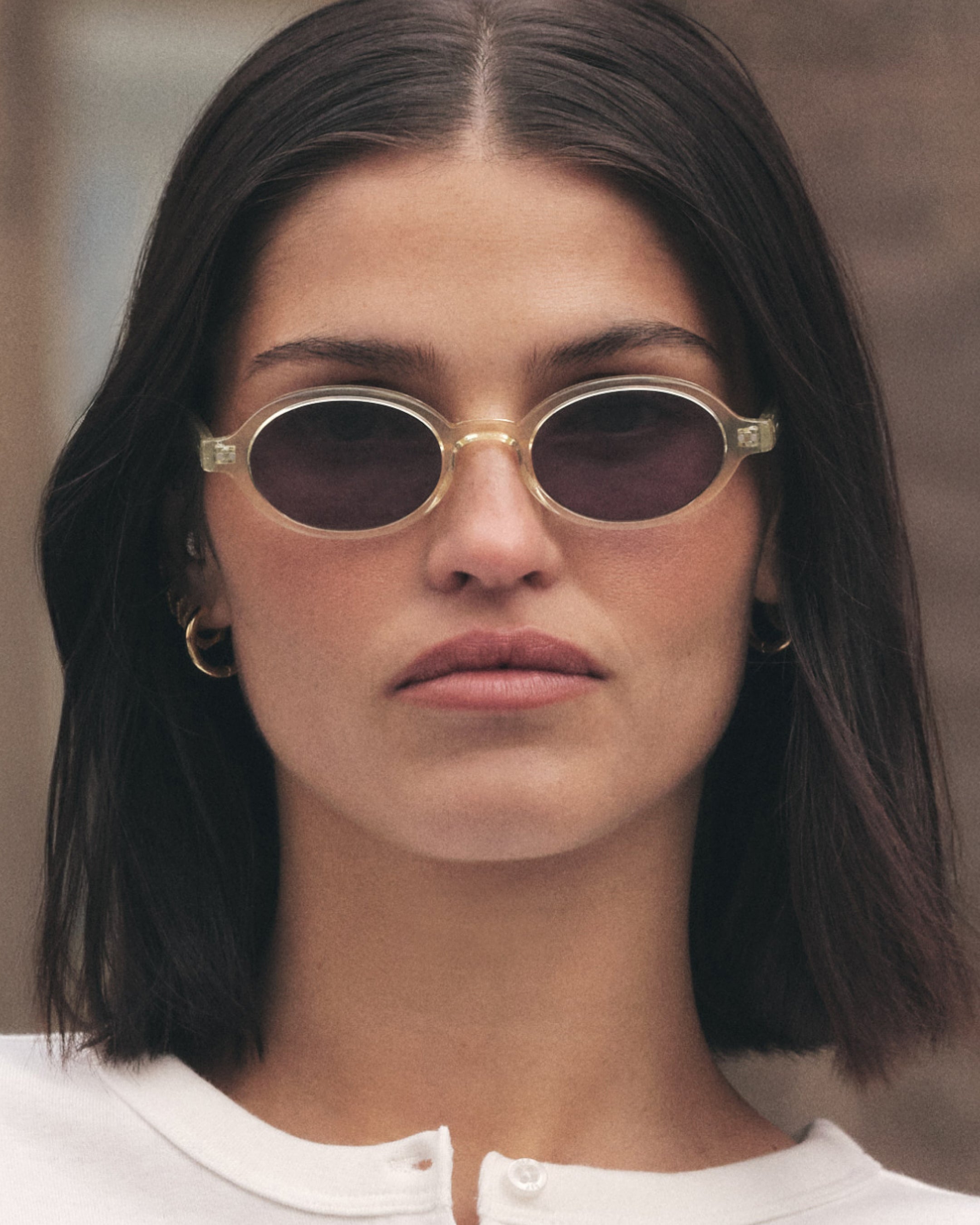 The Elvie Oval Women's Sunglasses in Crystal yellow