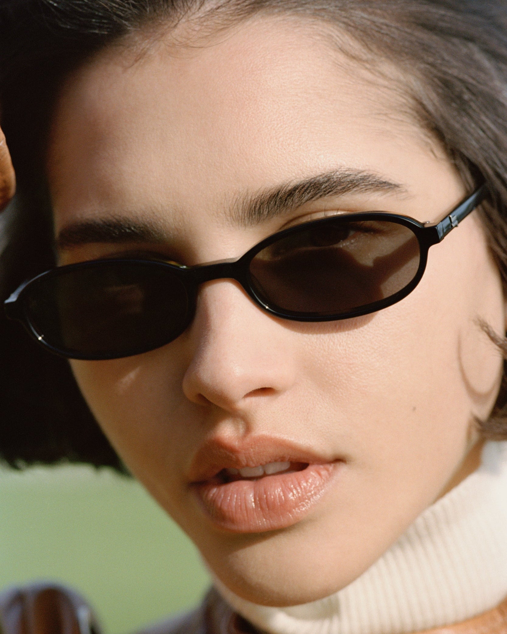 The Emmy Oval Women's Sunglasses in Black